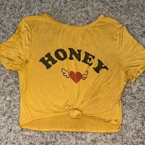 Yellow tie knot t-shirt.
